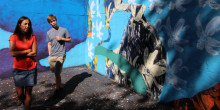 Un grafit d’un artista local decora un pàrquing a Ordino