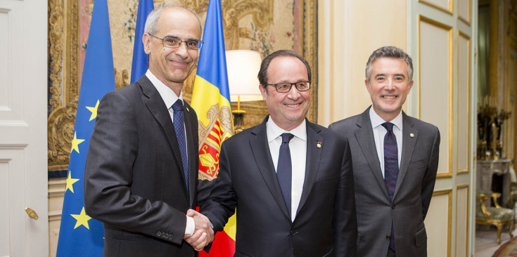 Antoni Martí i Vicenç Mateu amb François Hollande.
