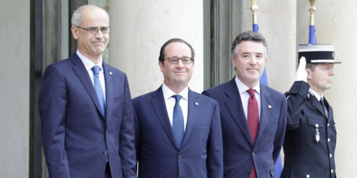 Martí i Mateu en una visita anterior al copríncep francès, François Hollande