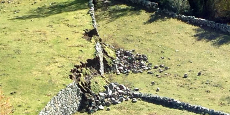 La paret de feixa caiguda a Ràmio, a la Vall del Madriu-Perafita-Claror.
