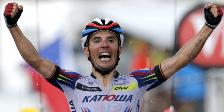Joaquim Rodríguez, amb gest de ràbia i esforç camí de la seva segona victòria en el Tour de França, després d’una bona pujada al Plateau de Beille, ahir.